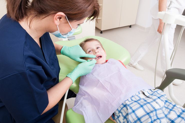 герметизация зубов у детей